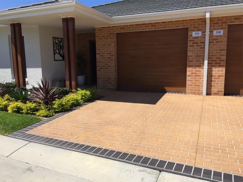 Driveway With Brick-style Pavers — Easy Mix Concrete in Berkeley Vale, NSW