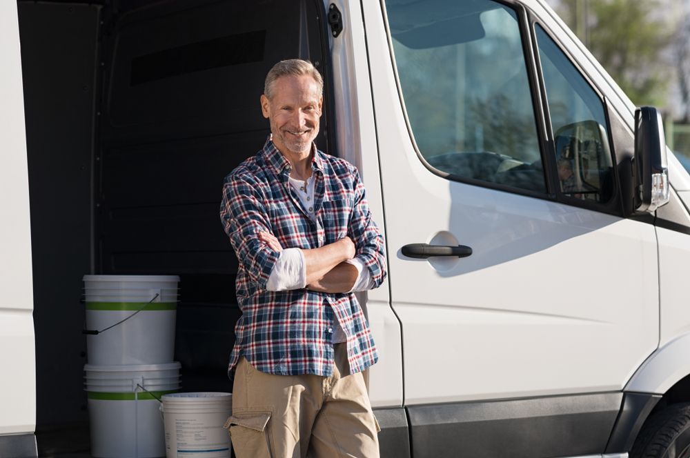 Man Standing Outside of His Open Van — Michael Andrews Taxation & Accounting Services In Pacific Paradise, QLD