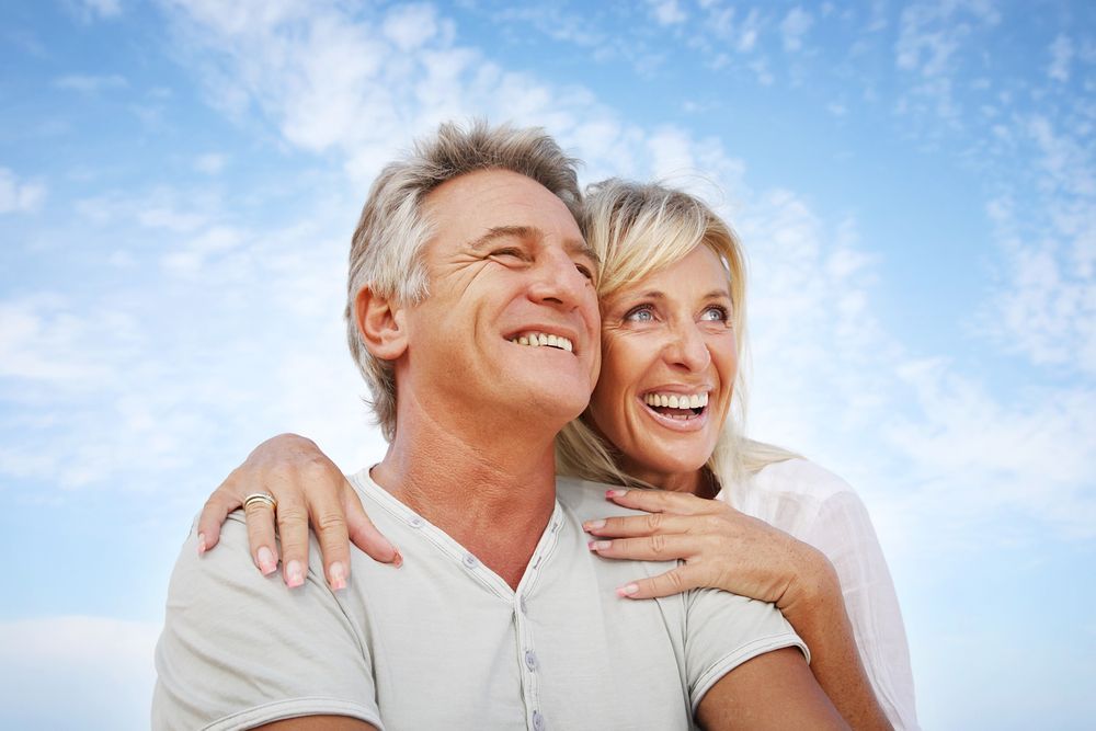 Smiling Couple — Michael Andrews Taxation & Accounting Services In Pacific Paradise, QLD