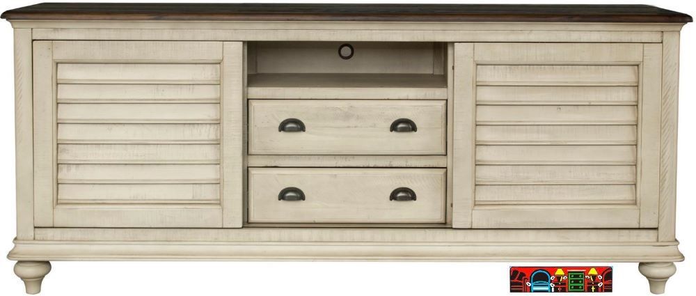 Brockton 72-Media Console, crafted from solid wood, features a wheat color with a dark brown top, both exhibiting a distressed finish. It includes louver accents and contrasting metal handles.
