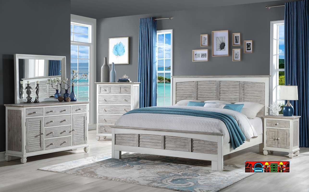 'The Islamorada Bedroom Collection features a white and distressed grey finish, crafted from solid wood with dovetail drawers. Its coastal design is accentuated by louver accents.' Available at Bratz-CFW. Fort Myers FL.