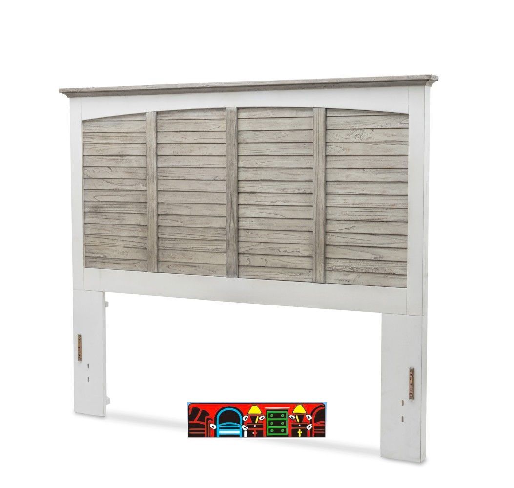 The Islamorada Panel Headboard features a wooden construction with a white and distressed grey finish, coastal design elements, and shutter accents.