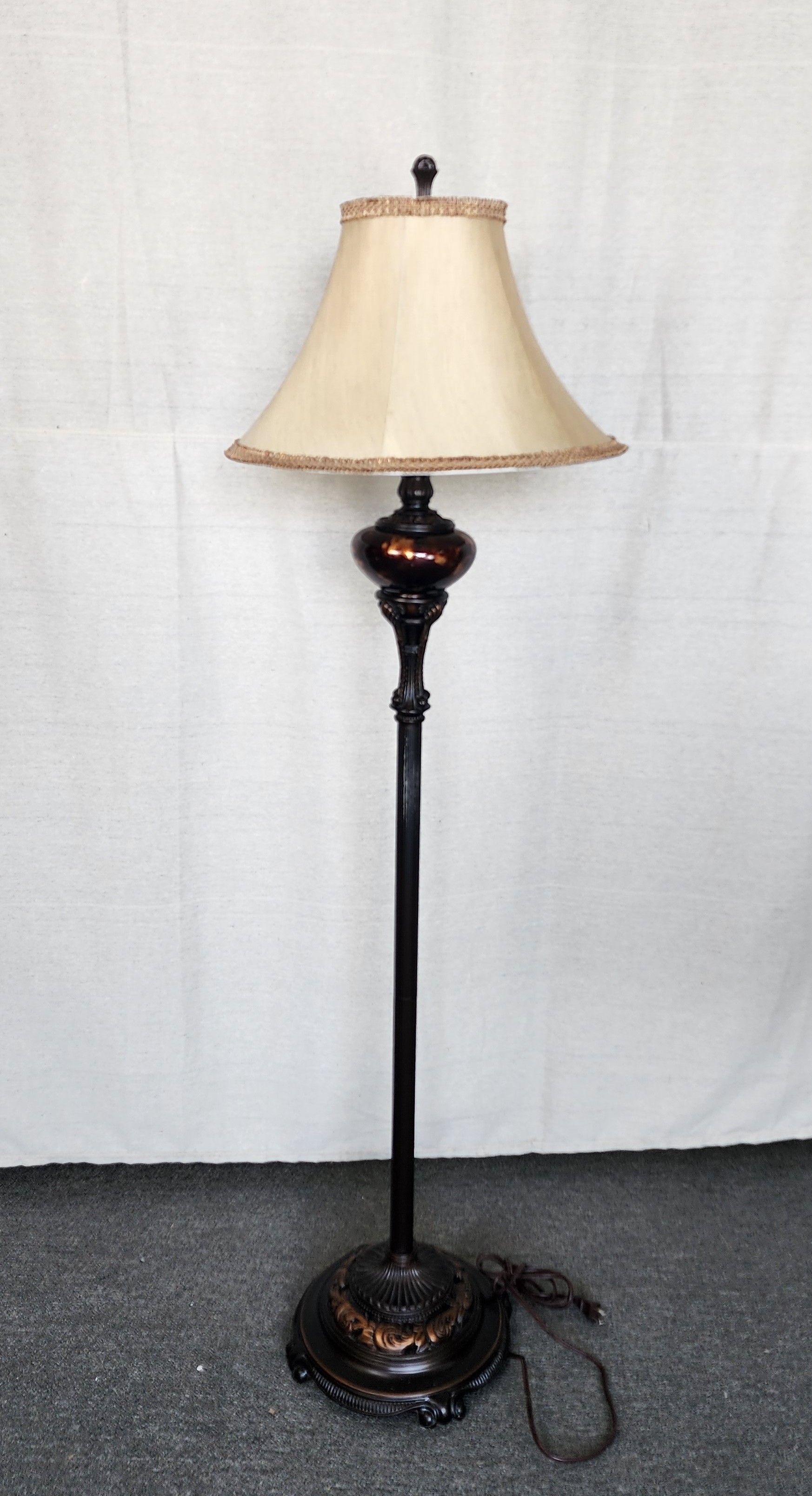Dark brown-grey iron floor lamp with red marble accent and beige shade
