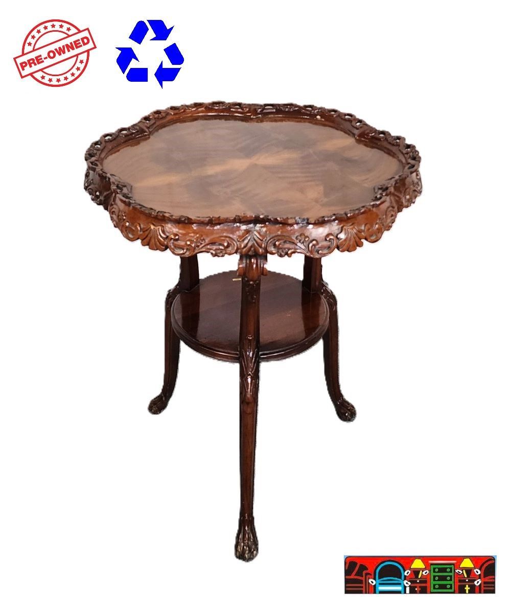 Dark wood round table with raised edge, 3 legs and shelf below Size: 22x28h
