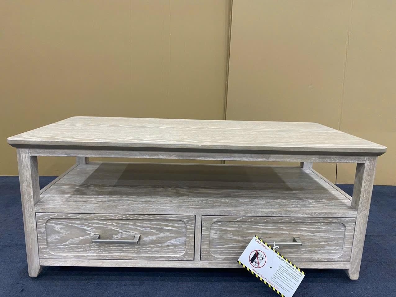 glazed driftwood color 2 drawer cocktail table with shelf and metal handles