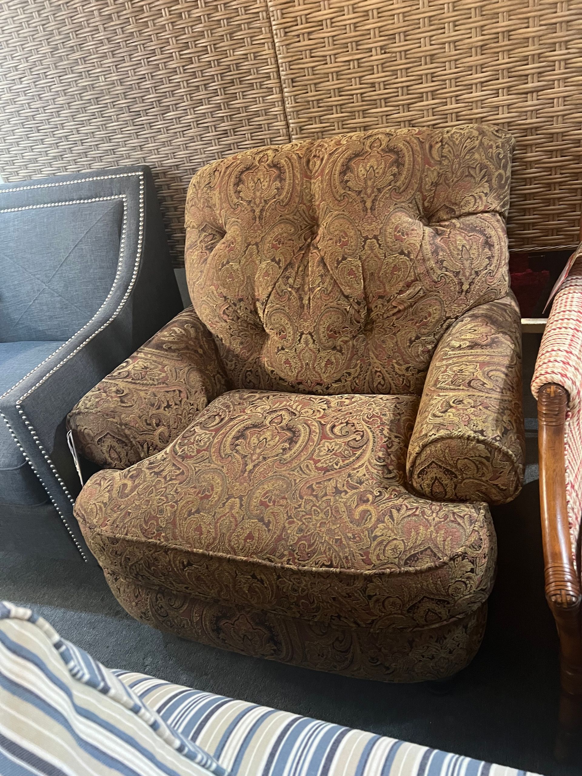 Paisley brown club chair with tufted back