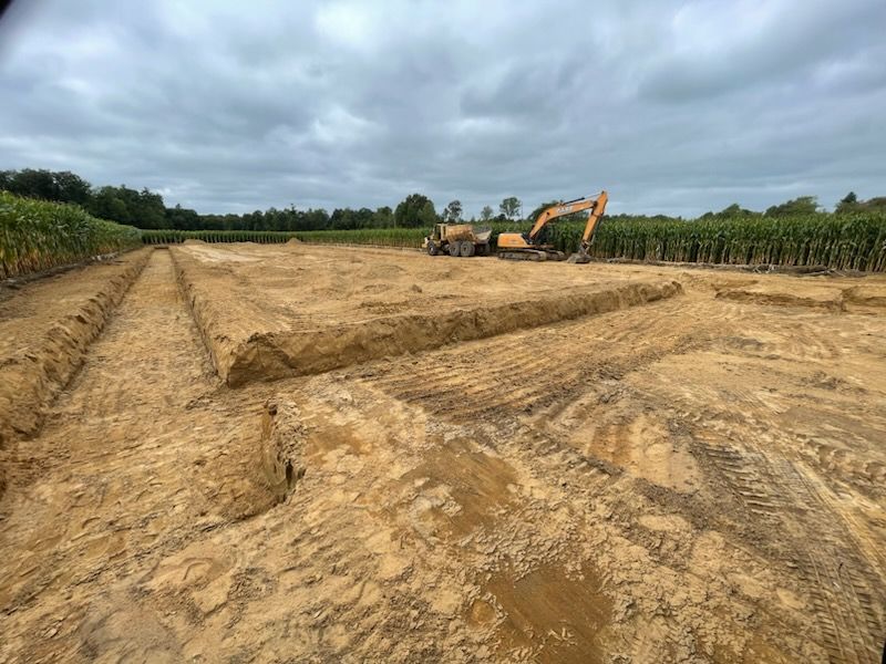 Barn/shop preparation with excavator