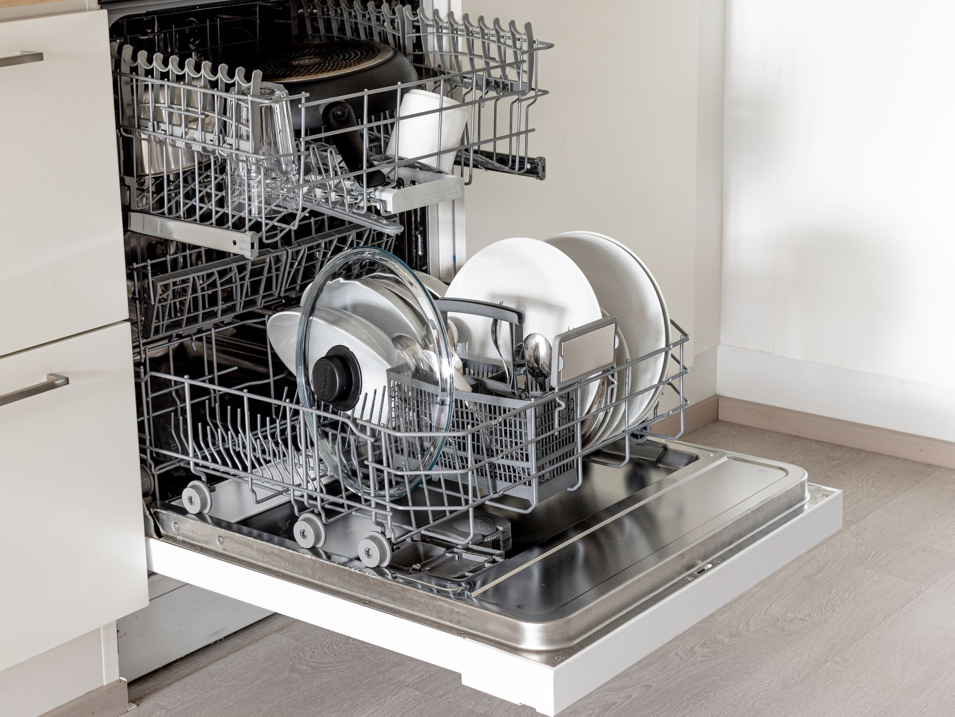Two Man Installing the Refrigerator — Timberville, VA — Matt’s Appliance Service Inc