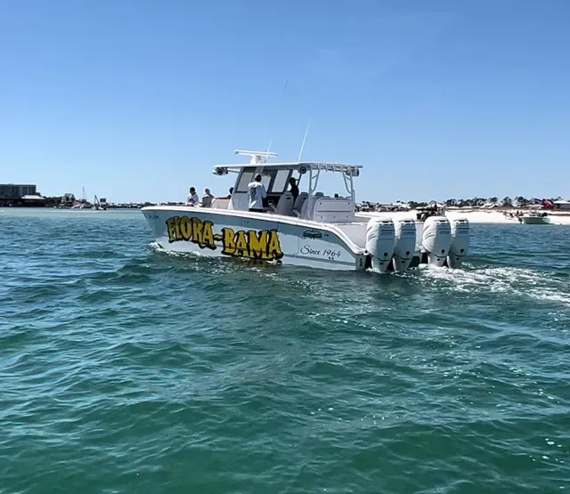 A white motorboat labeled