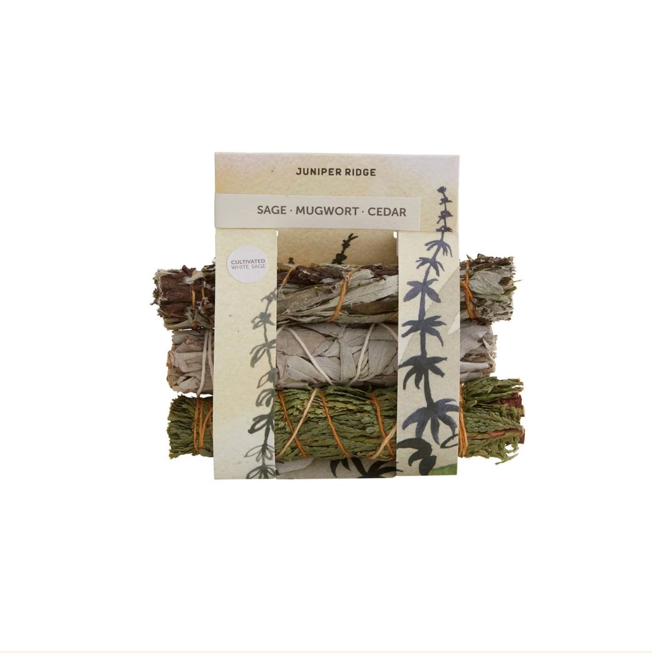 Bundled sage, juniper, and cedar sticks with a decorative label.