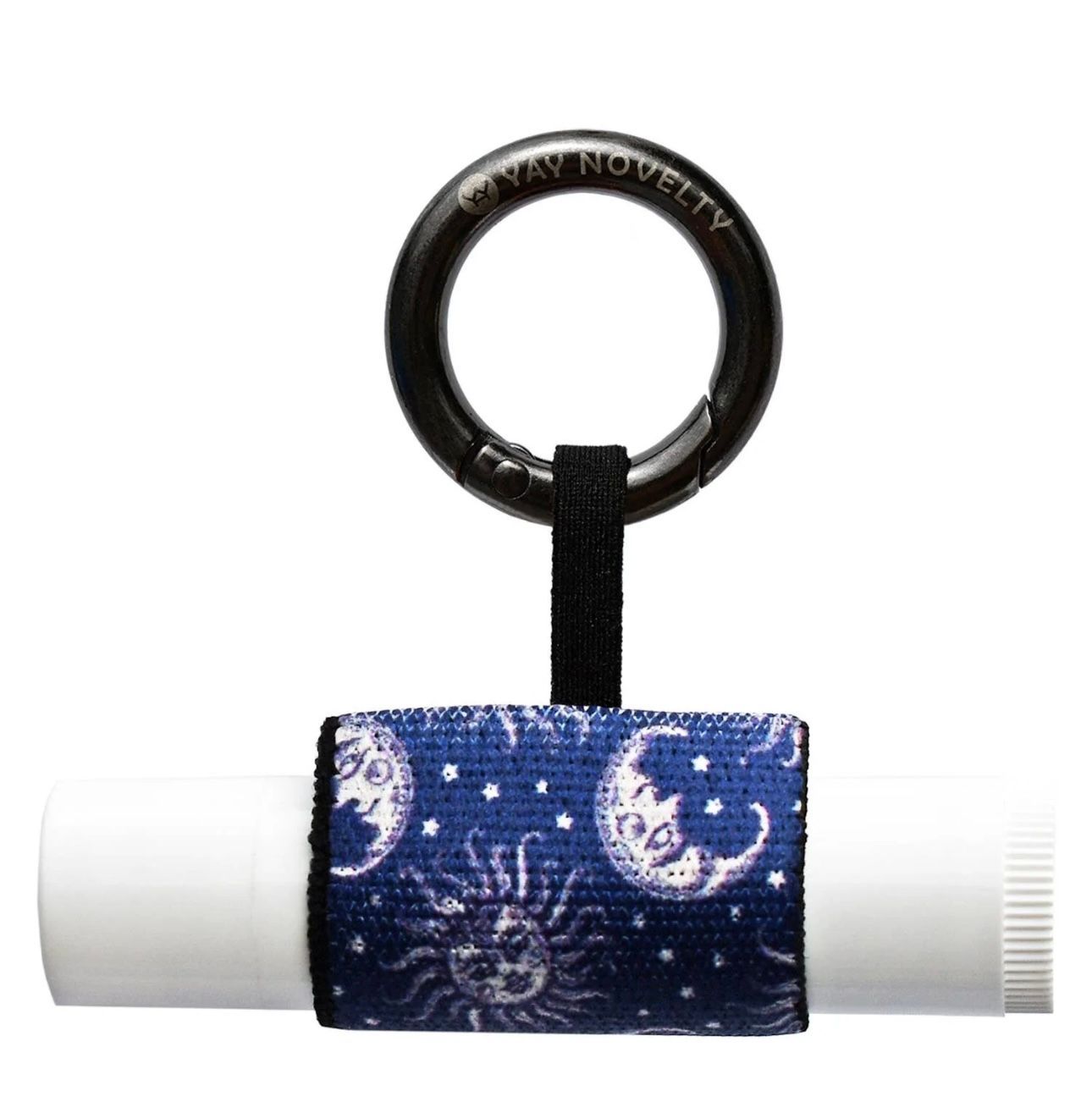Lip balm holder with moon and sun design; attached to a black carabiner.