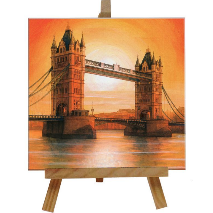 Tower Bridge painting on an easel, with warm orange sunset tones over the river.