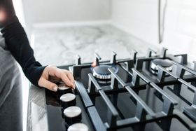 technician during stovetop and range repair service