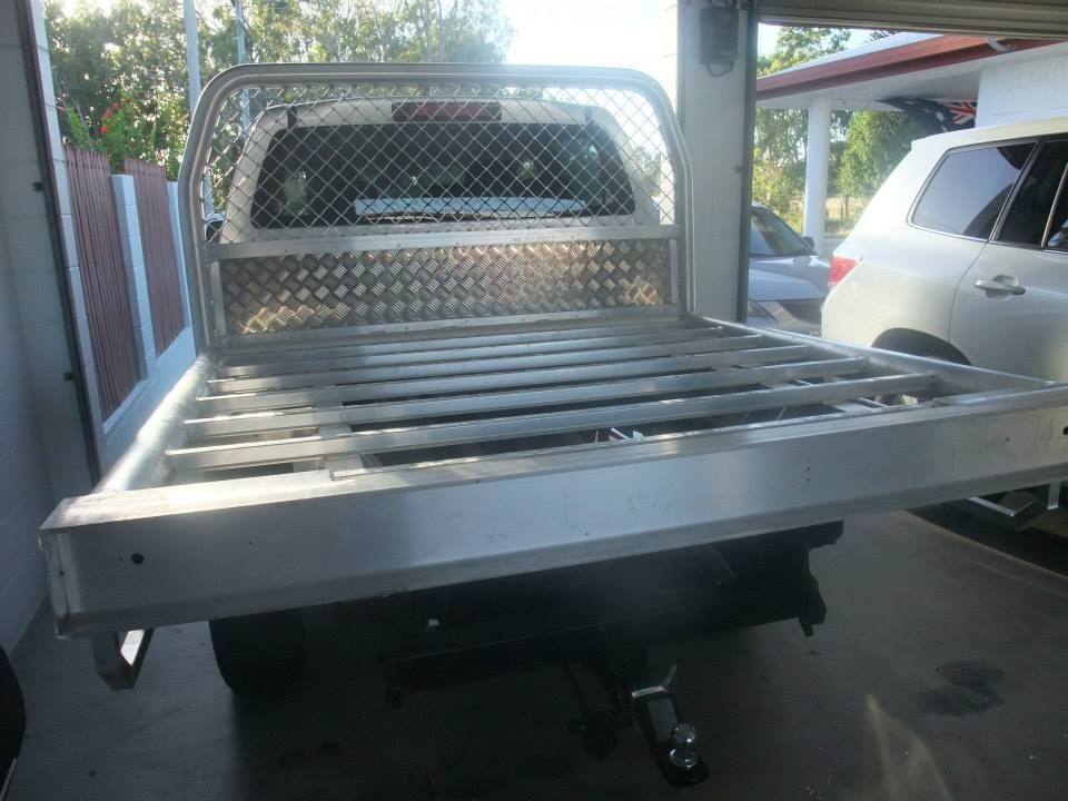 A Truck Is Parked In A Garage With A Bed In The Back — Kaplan Engineering Pty Ltd In Bowen, QLD