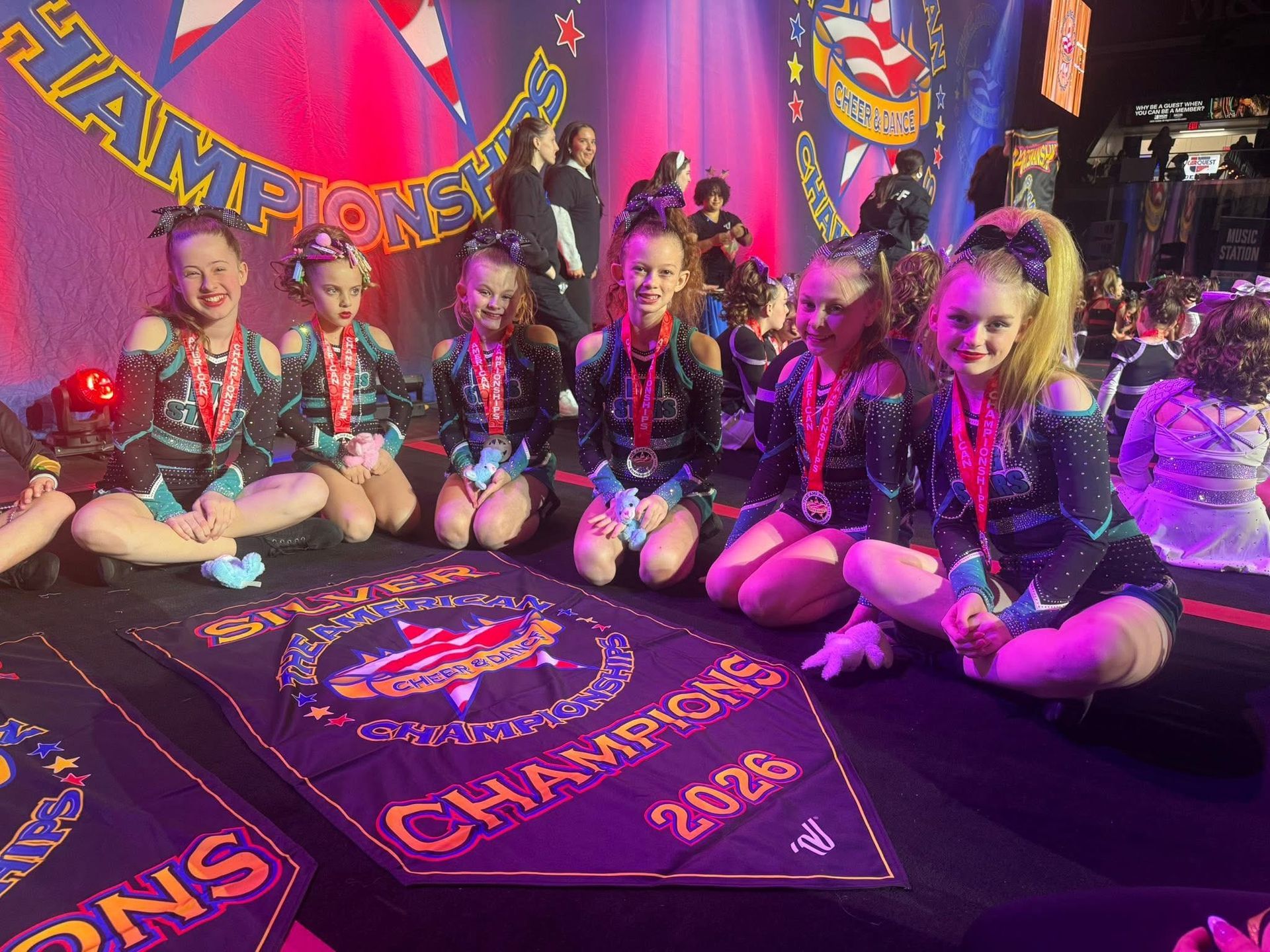 Cheerleaders with banner