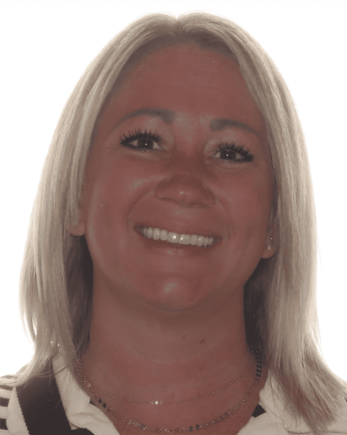 Woman with blonde hair smiling, wearing a patterned top, against a white background.