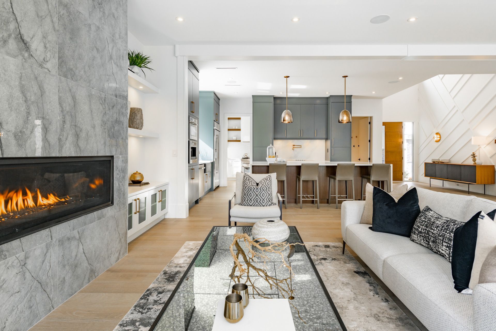 A living room with a fireplace and a couch
