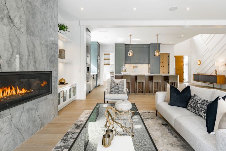 A living room with a fireplace and a couch