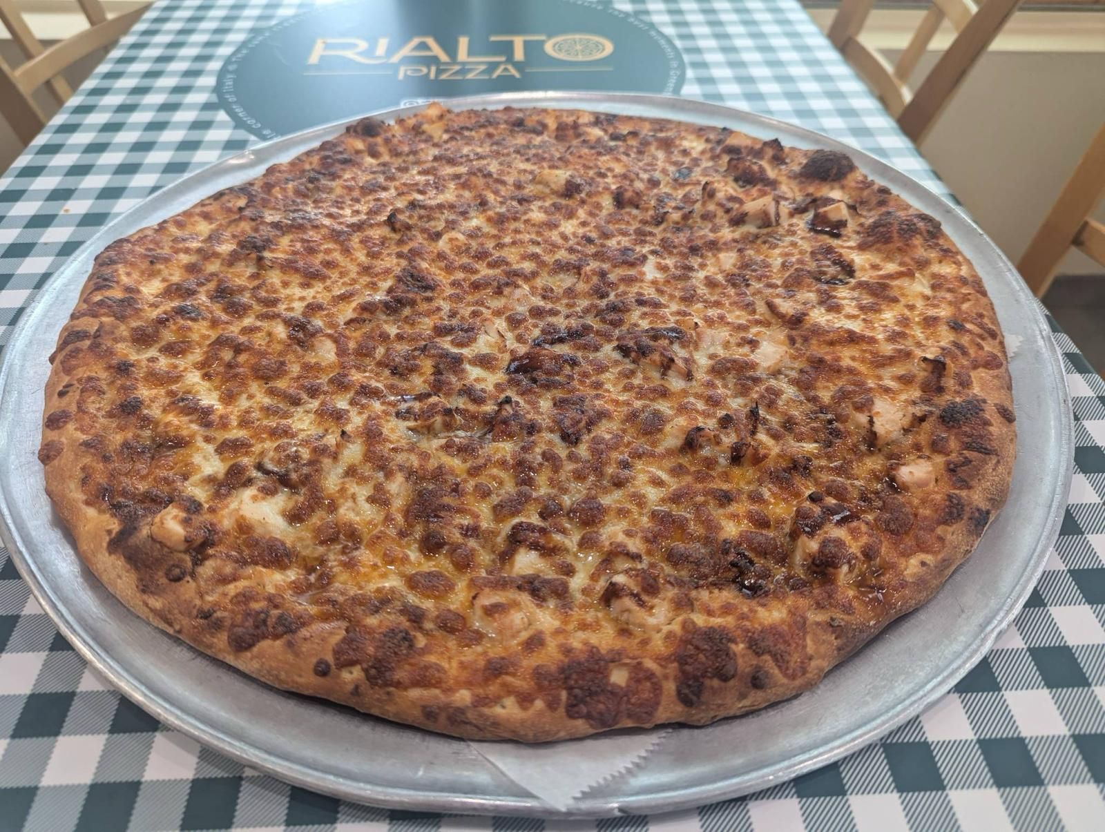 Rialto Pizza lunch special: Chicken wings, fries, and soda for $13.99, Monday 11 AM-3 PM.