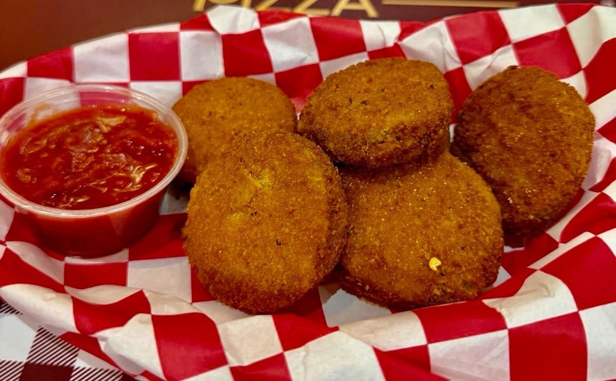 Rialto Pizza lunch special: Chicken wings, fries, and soda for $13.99, Monday 11 AM-3 PM.