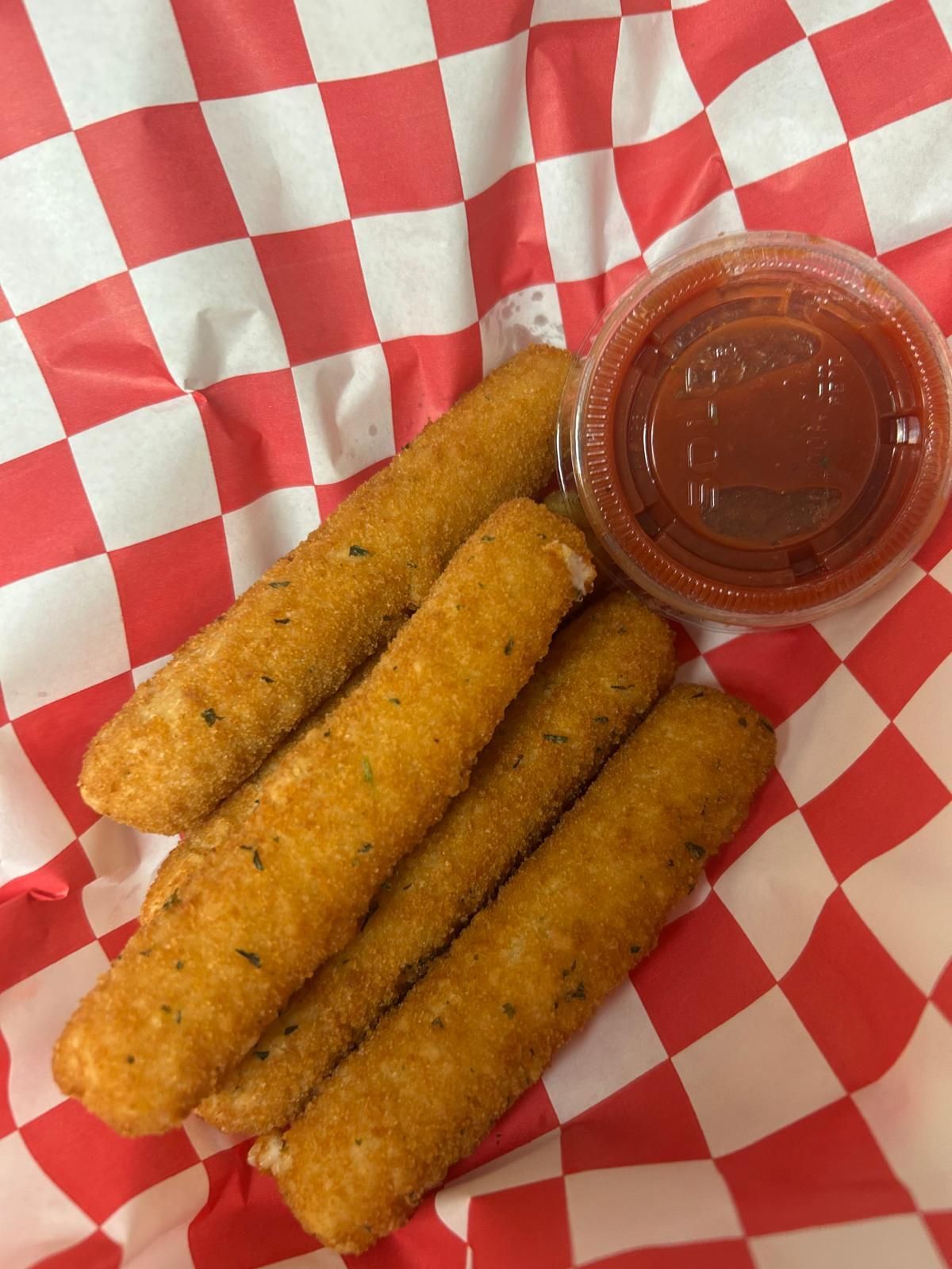 Rialto Pizza lunch special: Chicken wings, fries, and soda for $13.99, Monday 11 AM-3 PM.