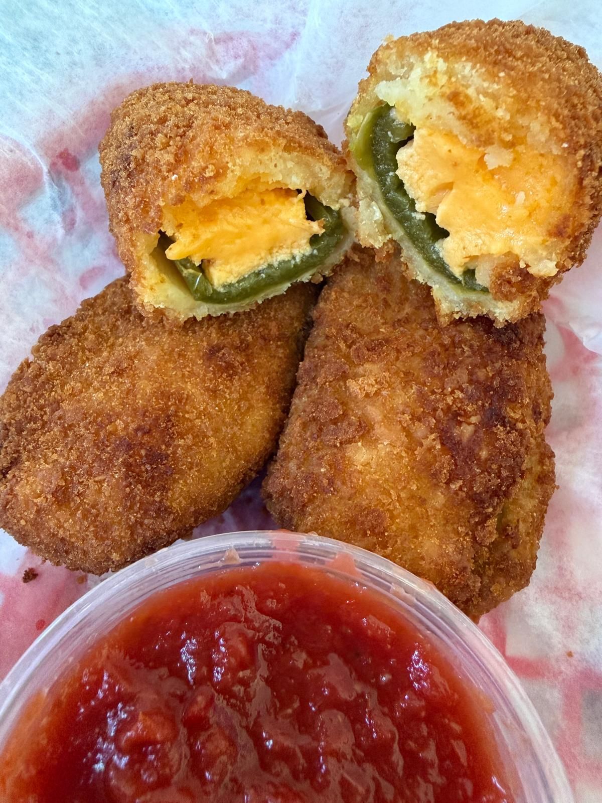 Rialto Pizza lunch special: Chicken wings, fries, and soda for $13.99, Monday 11 AM-3 PM.