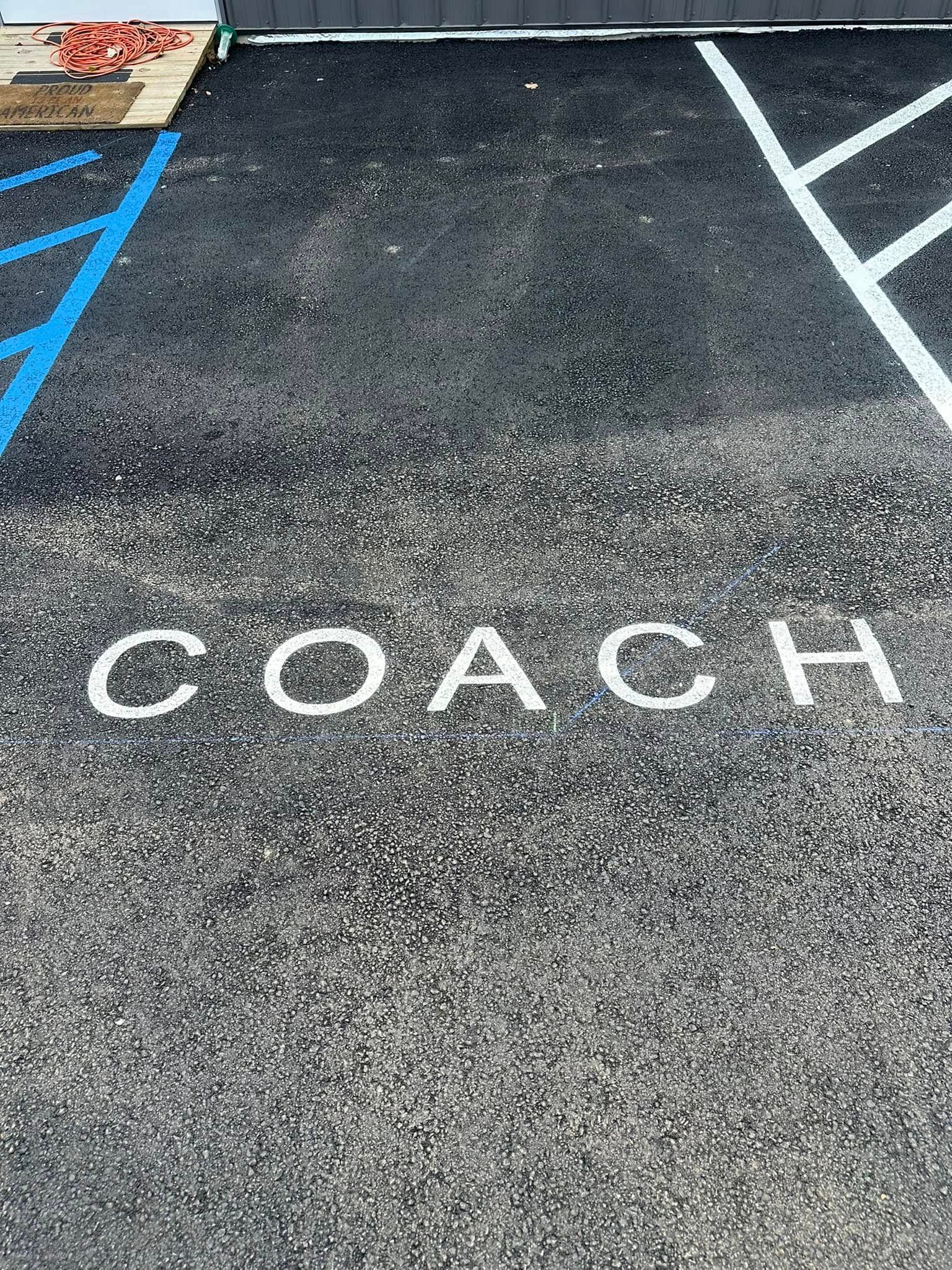 Asphalt parking space marked 