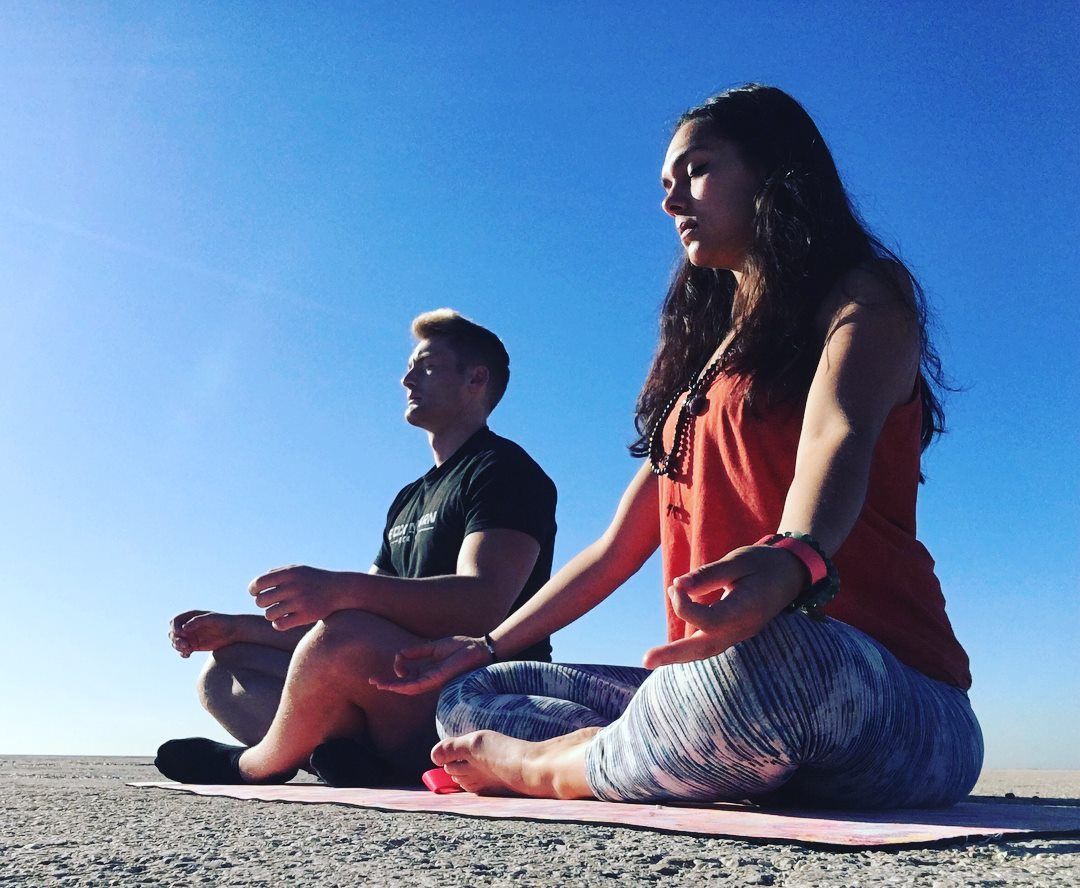 Xander Clemens with Emily Worsnop in Barcelona meditating.