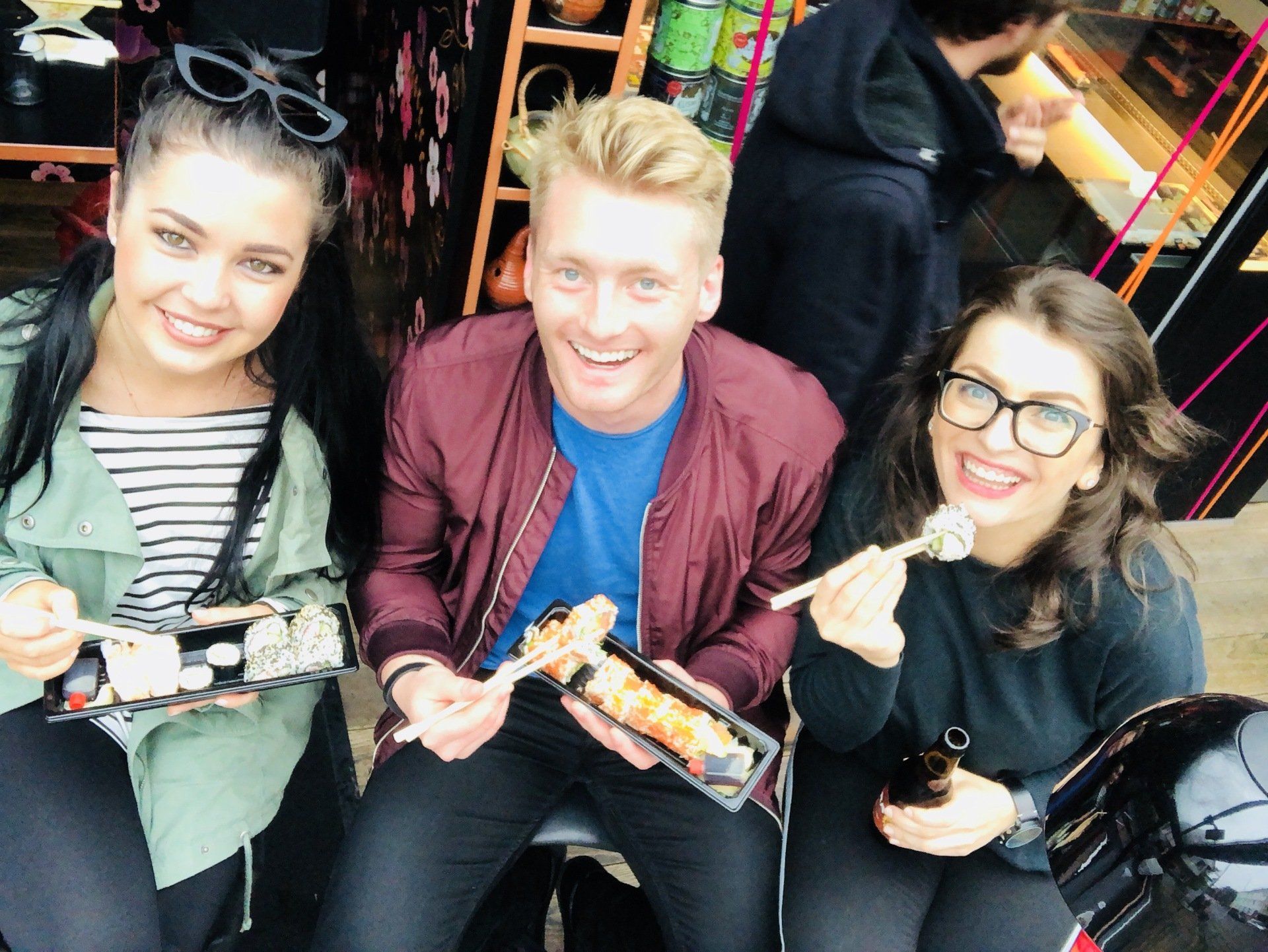 Xander Clemens eating sushi with Daniela Dume and Charlotte Haslett in the Faroe Islands