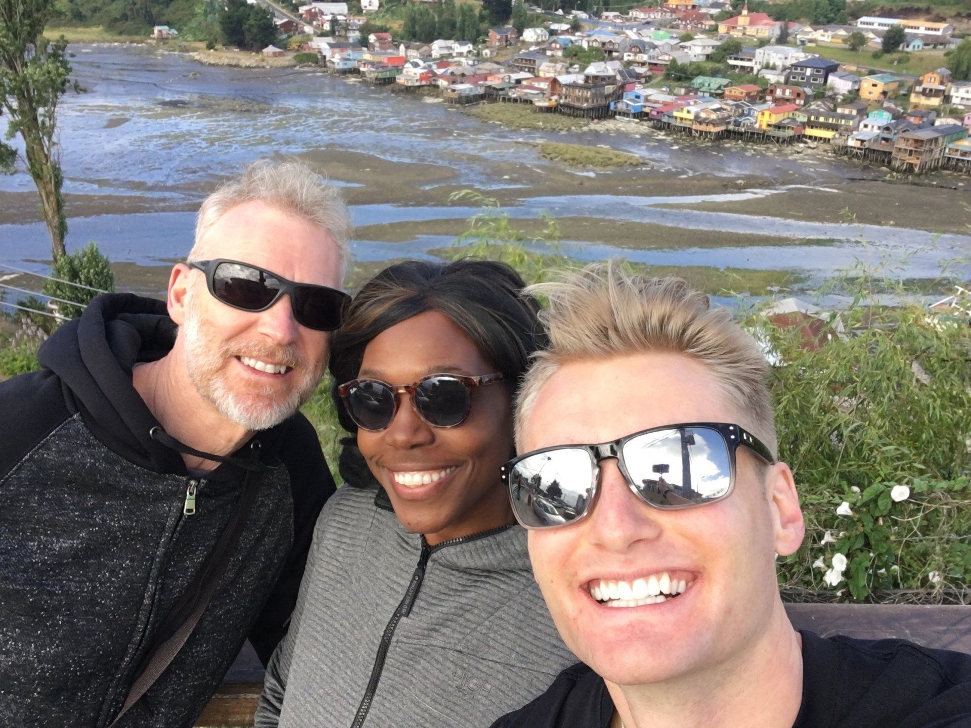 Xander Clemens in Castro, Chile with crew members of the Seabourn Quest .