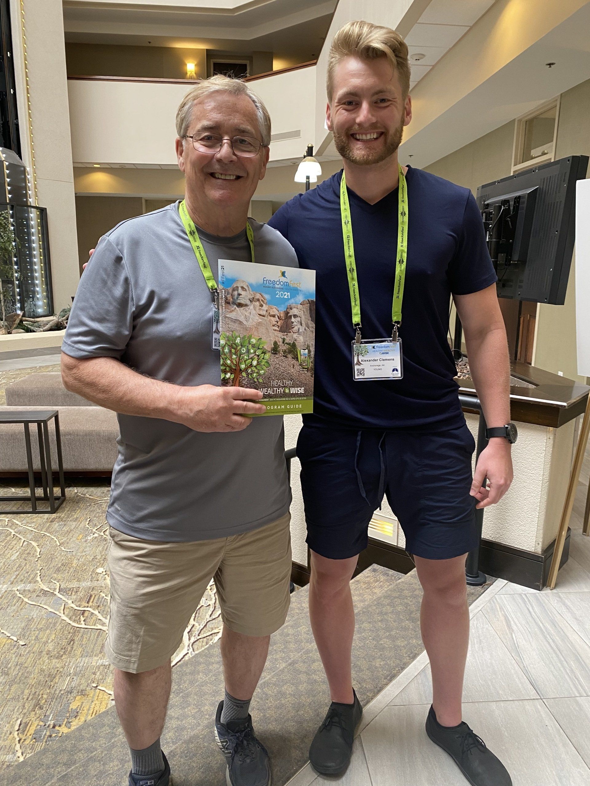 Xander Clemens with his father Alan Clemens at FreedomFest 2021 in Rapid City, South Dakota.
