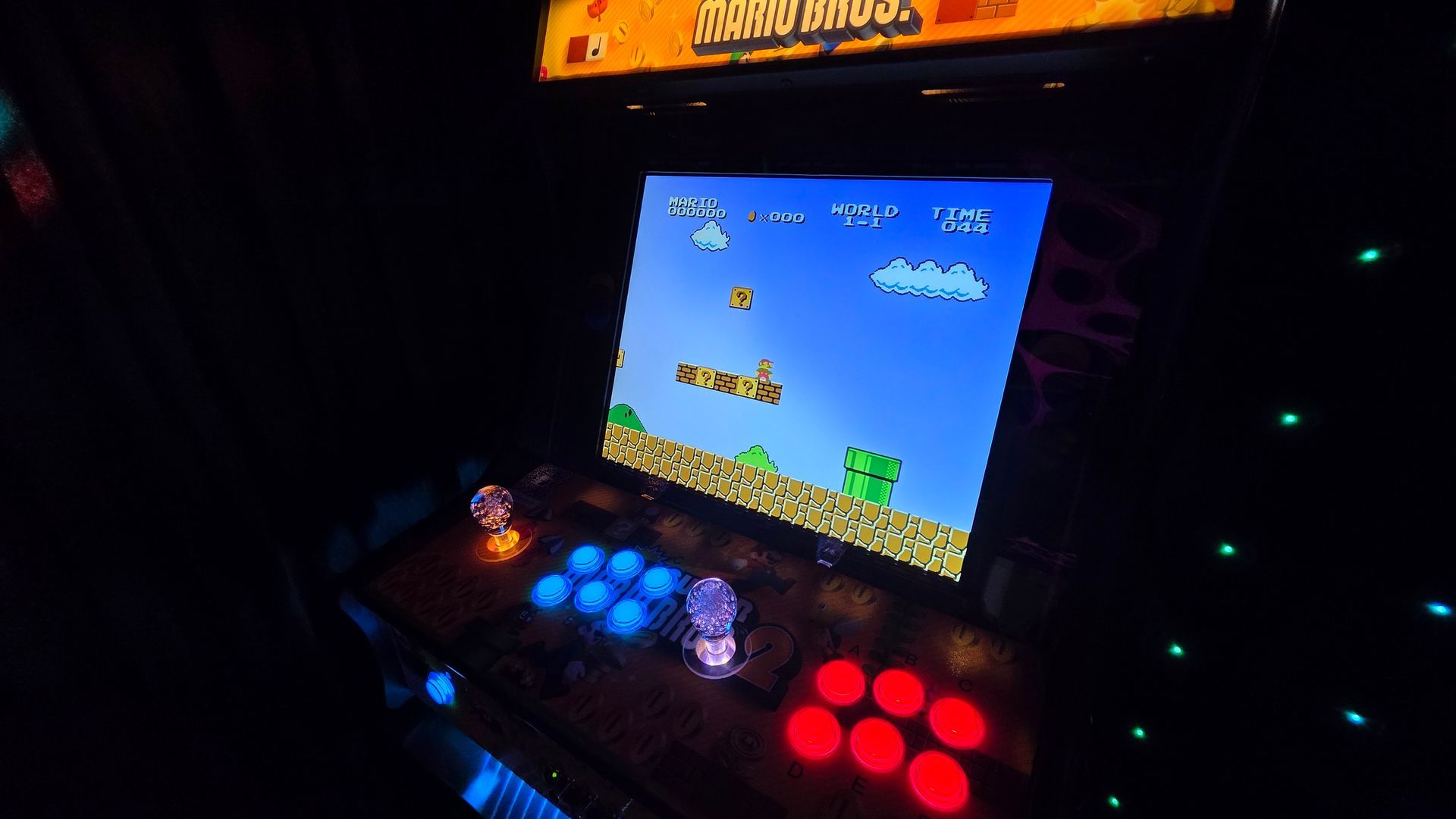 Arcade machine hire inside our black party marquee
