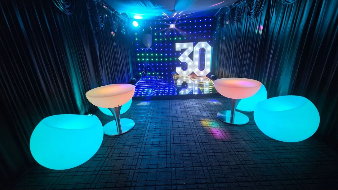 Our LED Dance floor for hire in our black party tent in Manchester