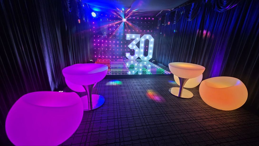 Our LED Dance floor for hire in our black party tent in Manchester