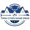 Logo for Twin Cities Shine Pros: blue houses with a pressure washer and cleaning droplets.