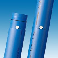Two blue pipes are sitting next to each other on a blue surface.