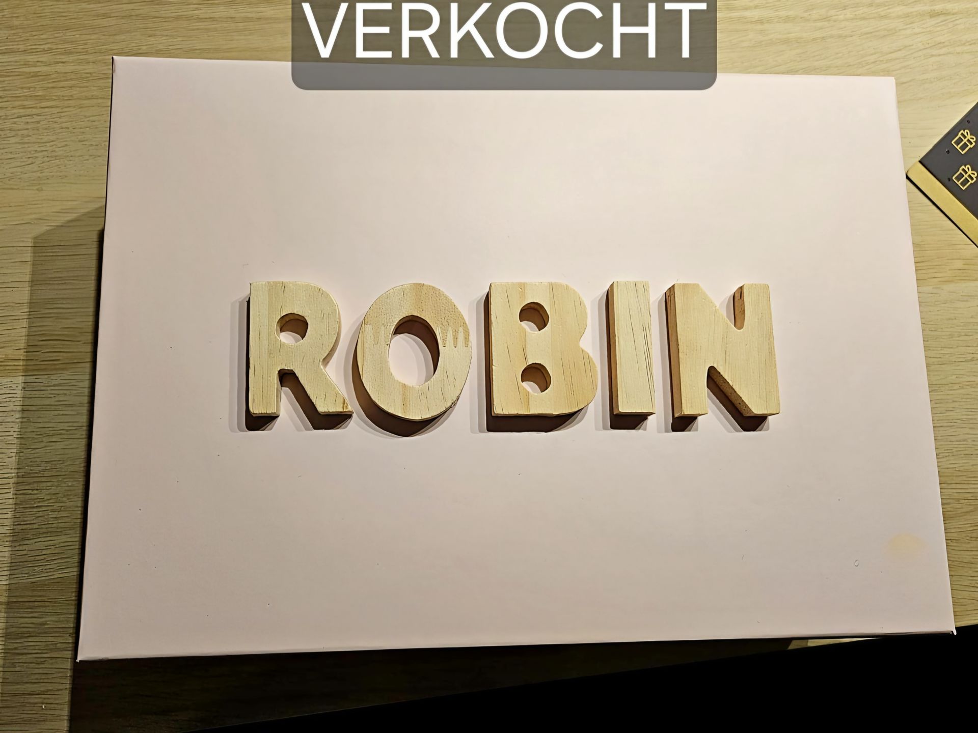 Houten letters die 