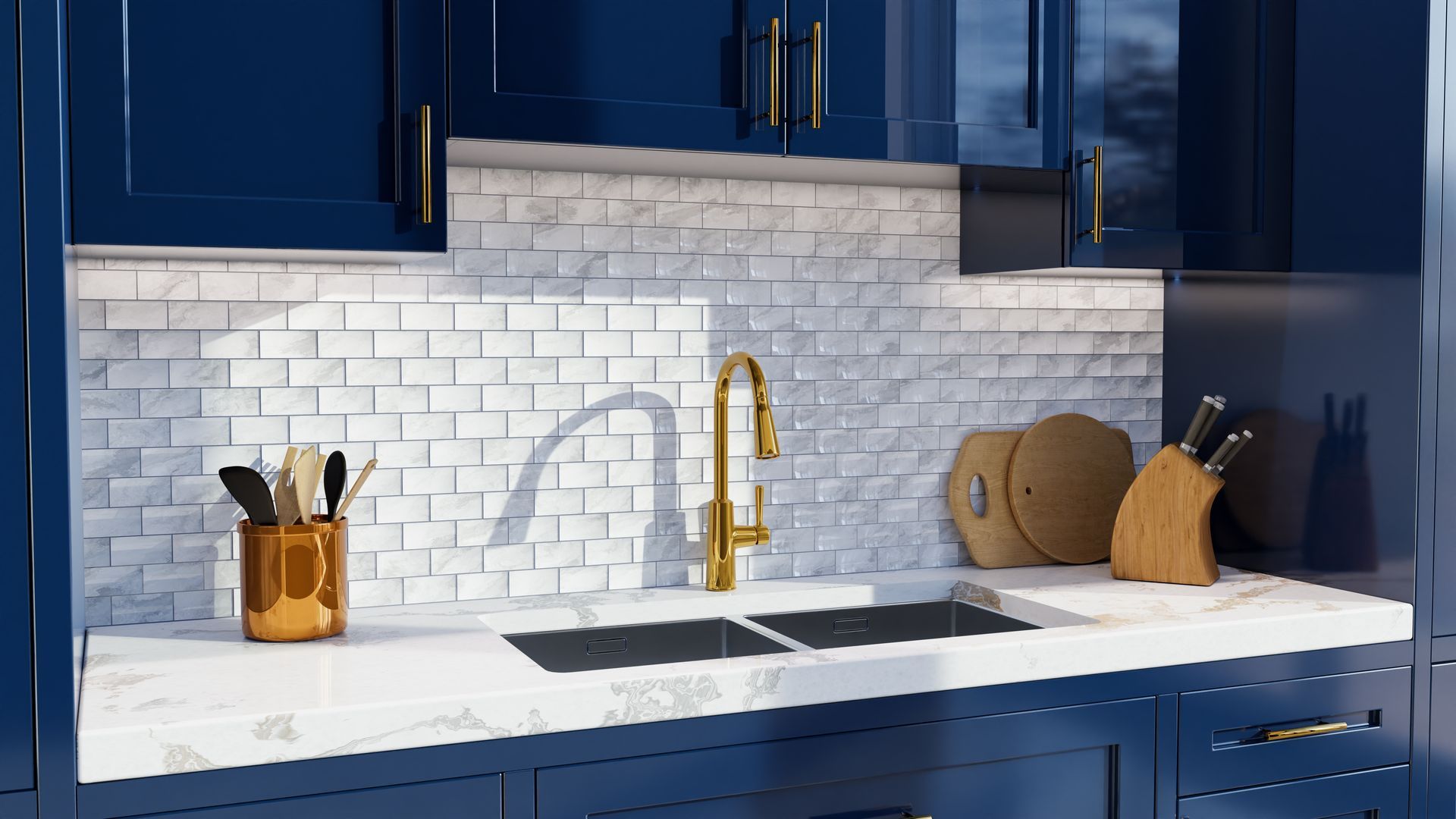 Blue kitchen with white subway tile backsplash, gold faucet, and white countertop with utensils and cutting boards