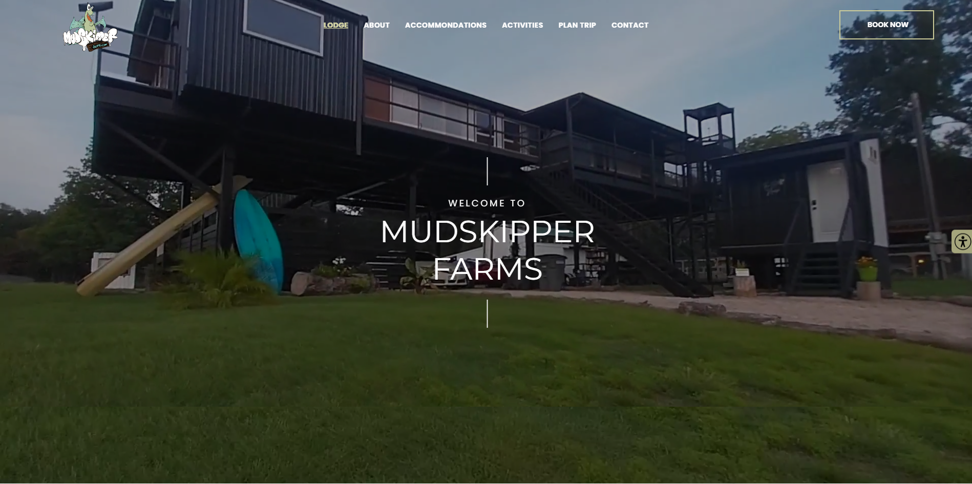 Mudskipper Farms A large house is sitting on top of a lush green field.