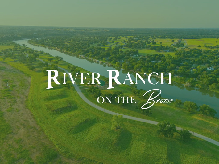 Aerial view: River Ranch on the Brazos. Green fields, river, and trees.