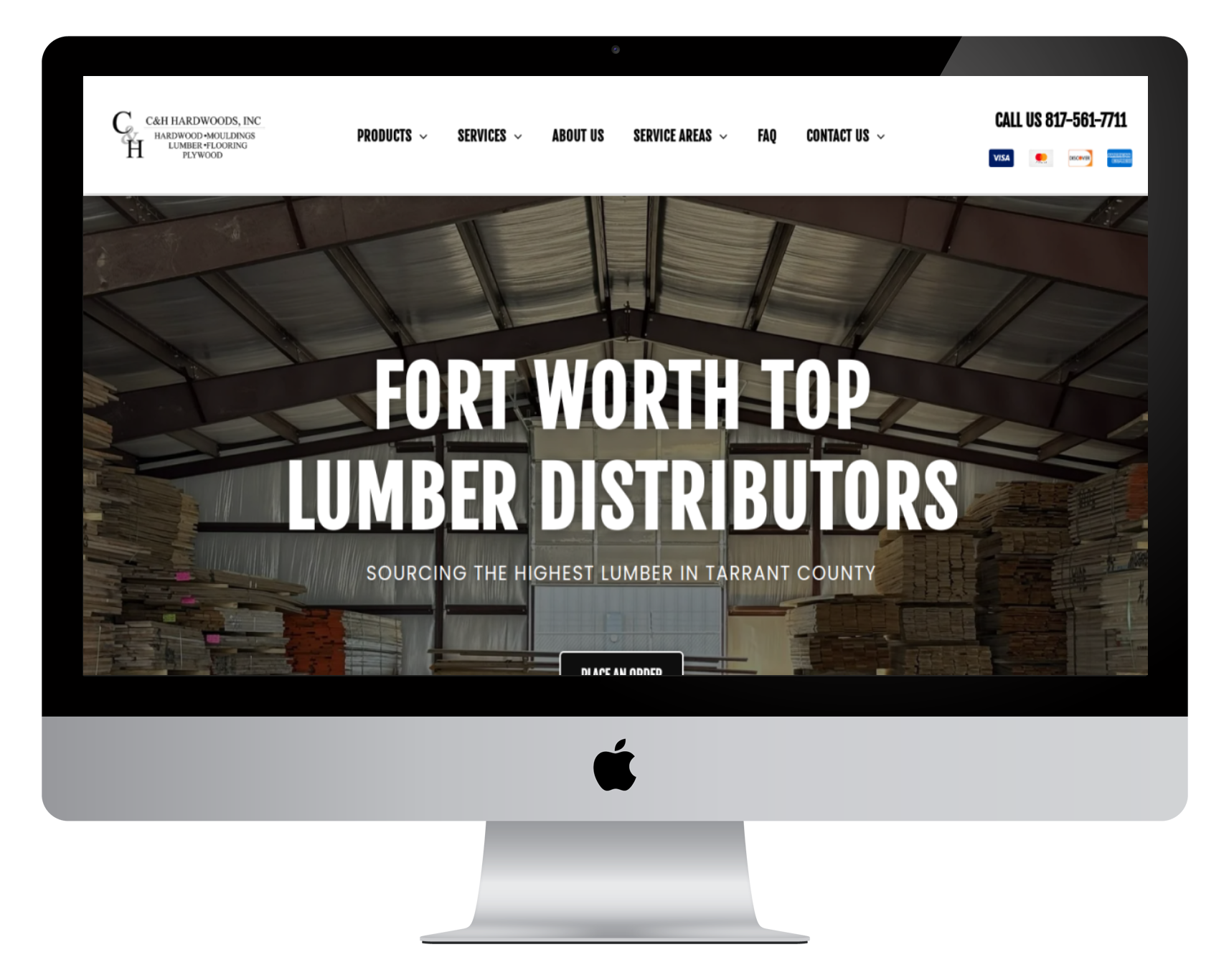 A computer monitor displaying a website for fort worth top lumber distributors.