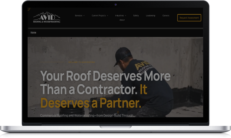 Laptop displaying a roofing website with the headline “Your Roof Deserves More Than a Contractor. It Deserves a Partner.”