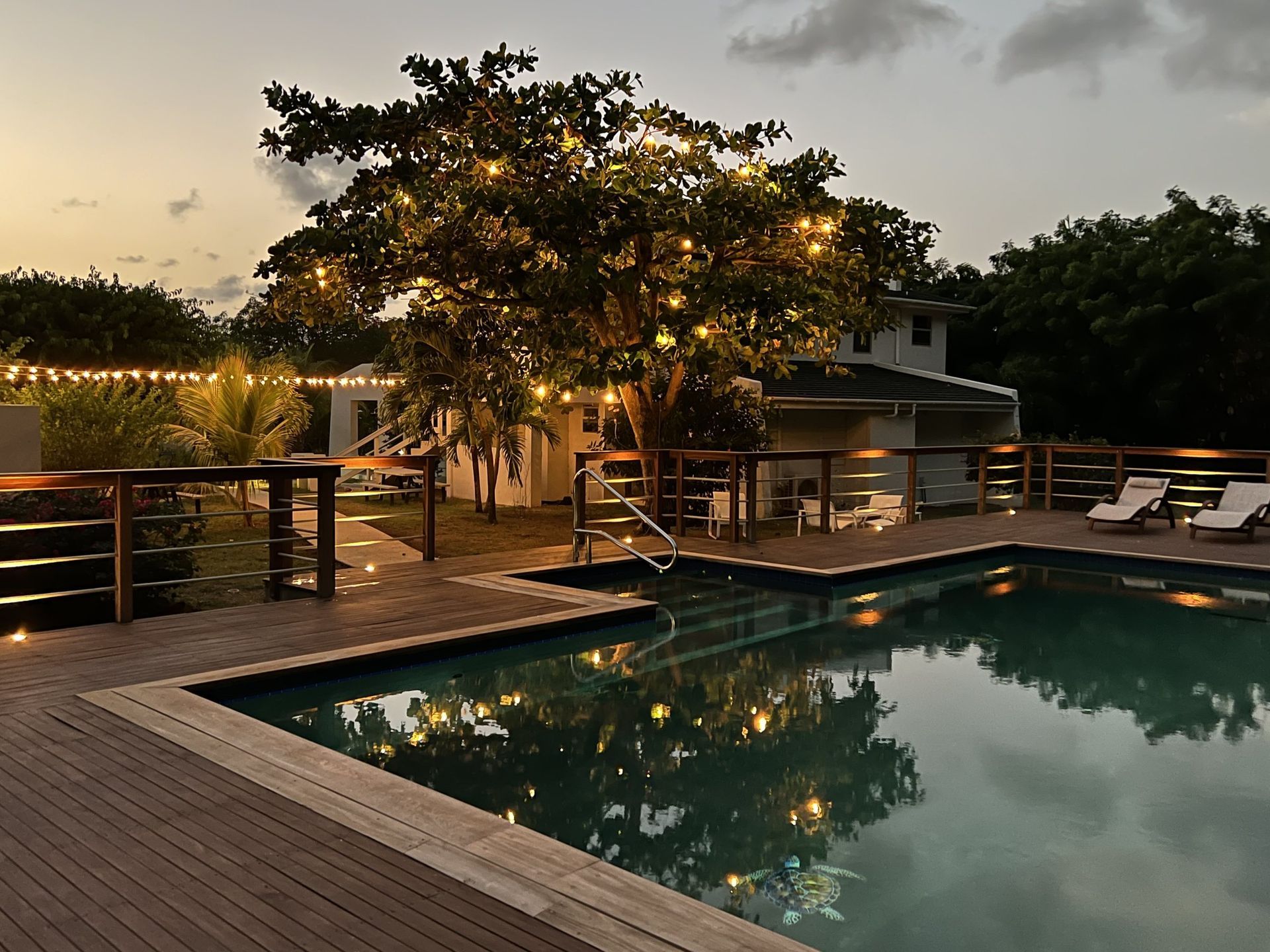 The pool at Mango Bay Resort at dusk