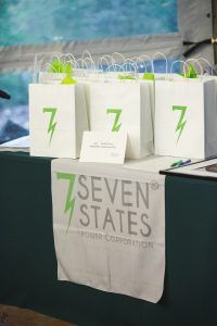 A table with a sign that says seven states on it