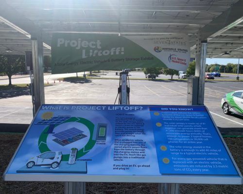 A sign in a parking lot that says project liftoff