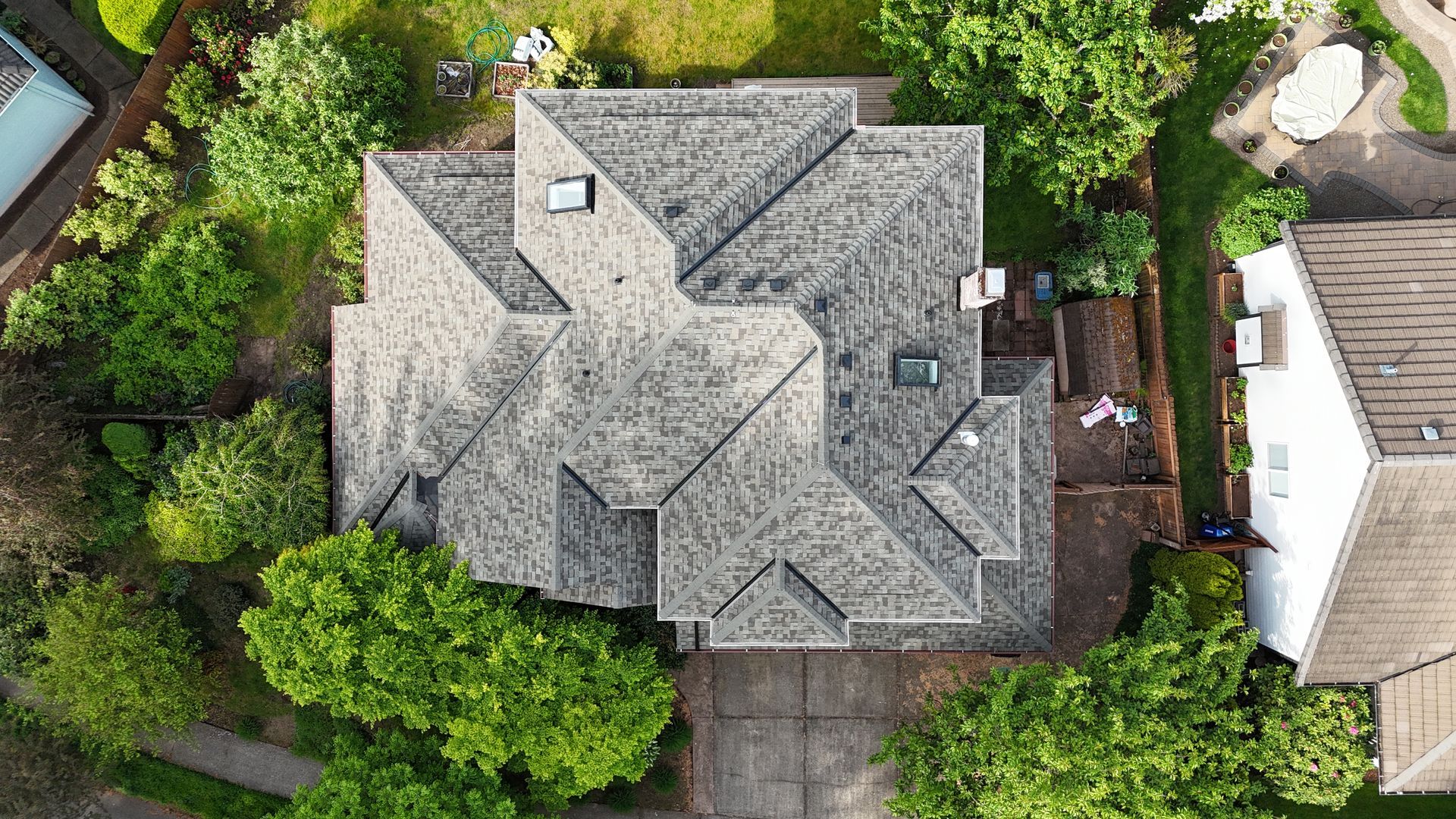 Your free roof cost calculator in Vancouver, WA gives you a quick, honest price range based on roof size, pitch, complexity, material, tear-off layers, and skylights or chimneys. Ballpark first, then tighten with a documented inspection and a clear scope.