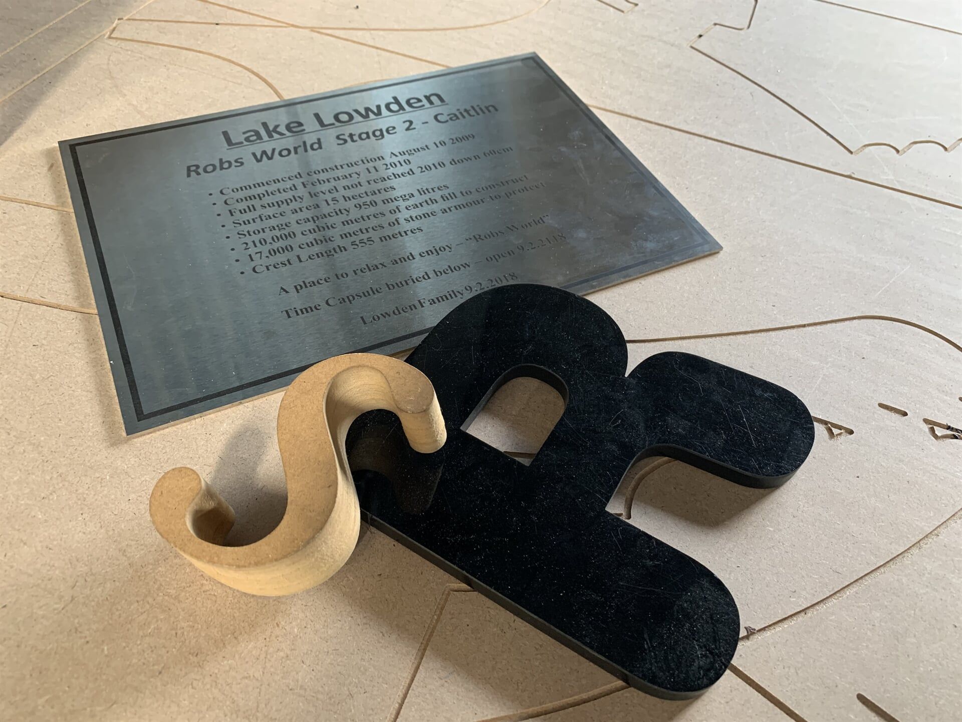 A Piece Of Wood With The Letter S On It — Cairns Signcorp In Portsmith, QLD