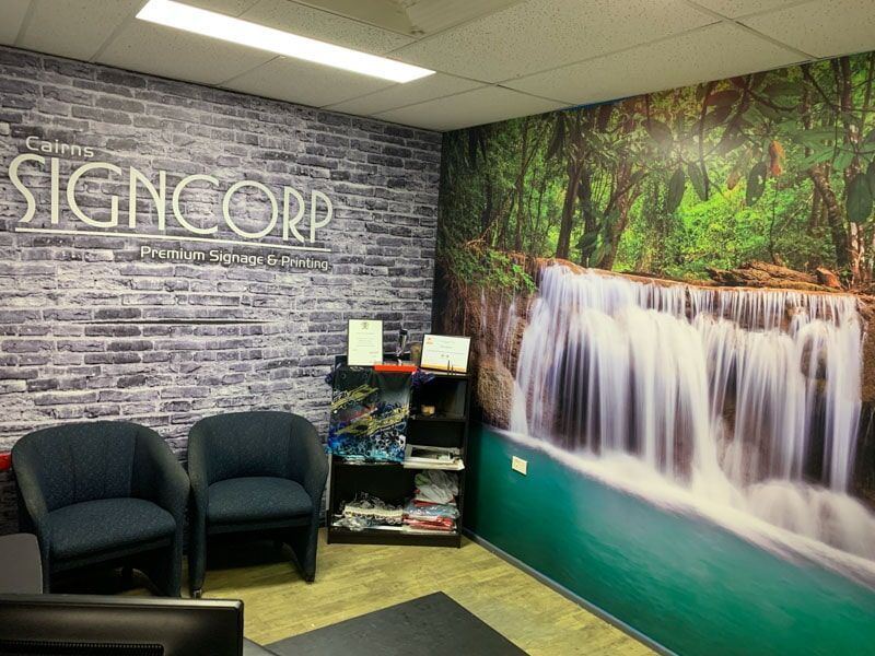 A Waiting Room With Chairs And A Waterfall On The Wall — Cairns Signcorp In Portsmith, QLD