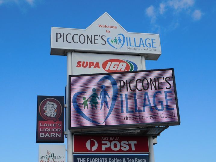 A Close-up View Of A Sign That Says Piccone's Village On It — Cairns Signcorp In Portsmith, QLD
