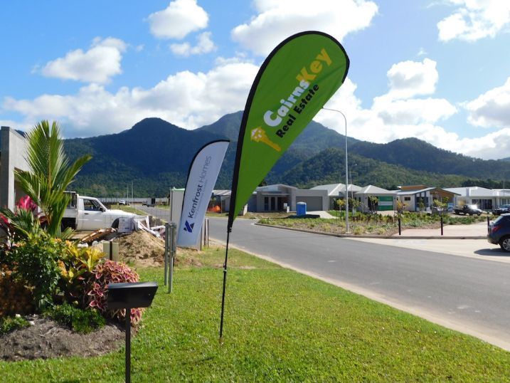 Cairns Key Real Estate Is Advertised On The Green Flag — Cairns Signcorp In Portsmith, QLD